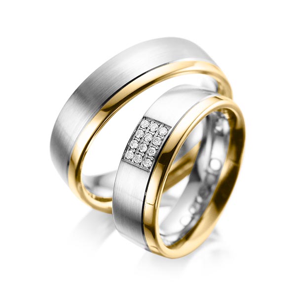 Set Bicolor trouwringen in grijsgoud 14 kt. geelgoud 14 kt. met in totaal 0,096 ct. Briljant tw/si van acredo