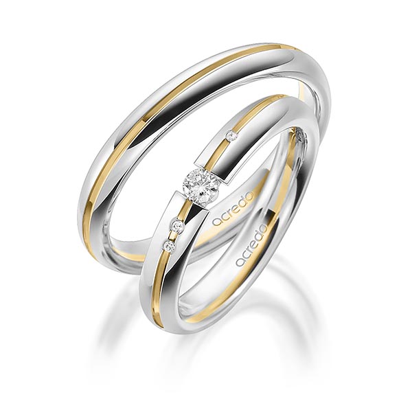 Set Bicolor trouwringen in grijsgoud 14 kt. geelgoud 14 kt. met in totaal 0,115 ct. Briljant tw/si van acredo