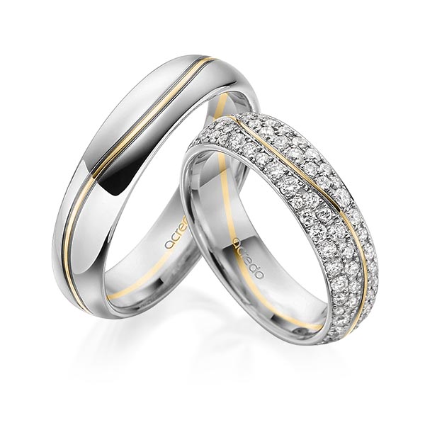Set Bicolor trouwringen in grijsgoud 14 kt. geelgoud 14 kt. met in totaal 1,506 ct. Briljant tw/si van acredo