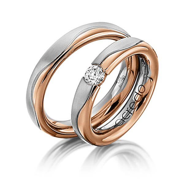 Set Bicolor trouwringen in grijsgoud 14 kt. roodgoud 14 kt. met 0,3 ct. Briljant tw/si van acredo