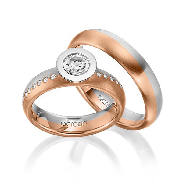 Set Bicolor trouwringen in grijsgoud 14 kt. roodgoud 14 kt. met 0,4 ct. + in totaal 0,175 ct. Briljanten & Briljant tw,vs tw/si van acredo - A-1538-11 Set Bicolor trouwringen in grijsgoud 14 kt. roodgoud 14 kt. met 0,4 ct. + in totaal 0,175 ct. Briljanten & Briljant tw,vs tw/si van acredo - A-1538-11