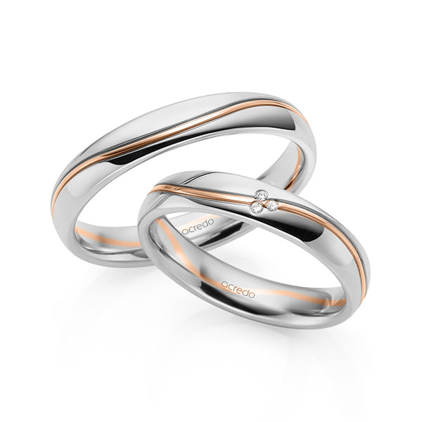 Set Bicolor trouwringen in grijsgoud 14 kt. roodgoud 14 kt. met in totaal 0,015 ct. Briljant tw/si van acredo - A-1704-11 Set Bicolor trouwringen in grijsgoud 14 kt. roodgoud 14 kt. met in totaal 0,015 ct. Briljant tw/si van acredo - A-1704-11