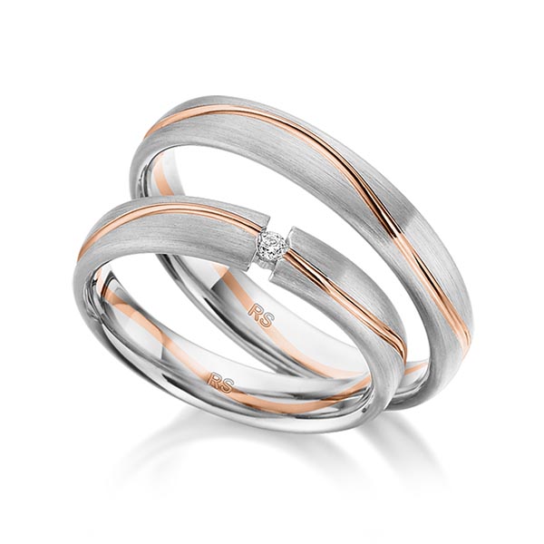 Set Bicolor trouwringen in grijsgoud 14 kt. roodgoud 14 kt. met in totaal 0,03 ct. Briljant tw/si van acredo