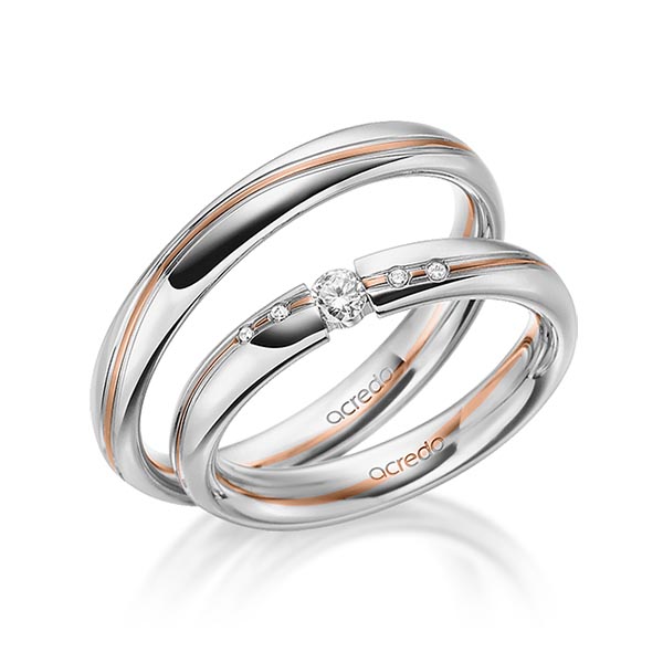 Set Bicolor trouwringen in grijsgoud 14 kt. roodgoud 14 kt. met in totaal 0,07 ct. Briljant tw/si van acredo