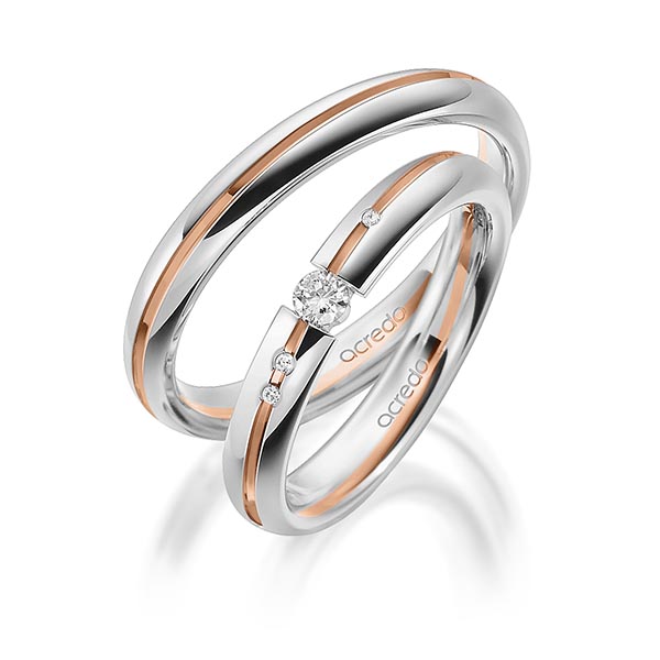 Set Bicolor trouwringen in grijsgoud 14 kt. roodgoud 14 kt. met in totaal 0,115 ct. Briljant tw/si van acredo