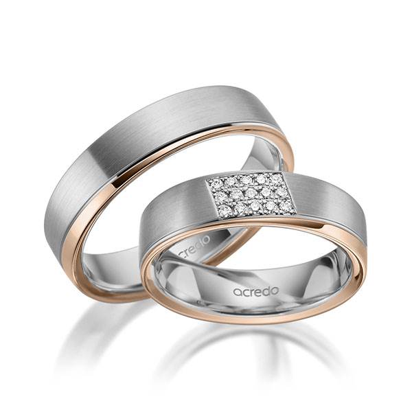 Set Bicolor trouwringen in grijsgoud 14 kt. roodgoud 14 kt. met in totaal 0,12 ct. Briljant tw/si van acredo - A-1978-11 Set Bicolor trouwringen in grijsgoud 14 kt. roodgoud 14 kt. met in totaal 0,12 ct. Briljant tw/si van acredo - A-1978-11
