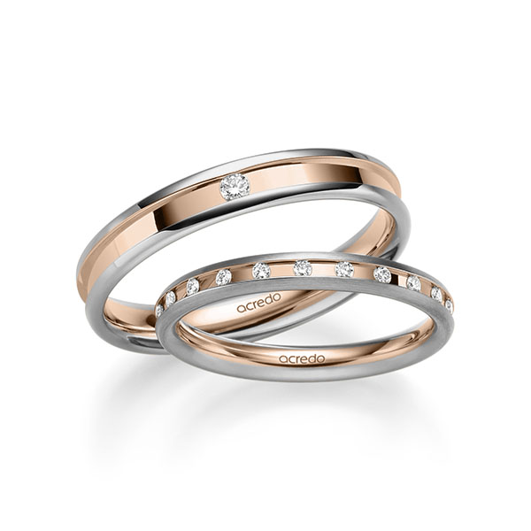 Set Bicolor trouwringen in grijsgoud 14 kt. roodgoud 14 kt. met in totaal 0,26 ct. Briljant tw/si van acredo Set Bicolor trouwringen in grijsgoud 14 kt. roodgoud 14 kt. met in totaal 0,26 ct. Briljant tw/si van acredo