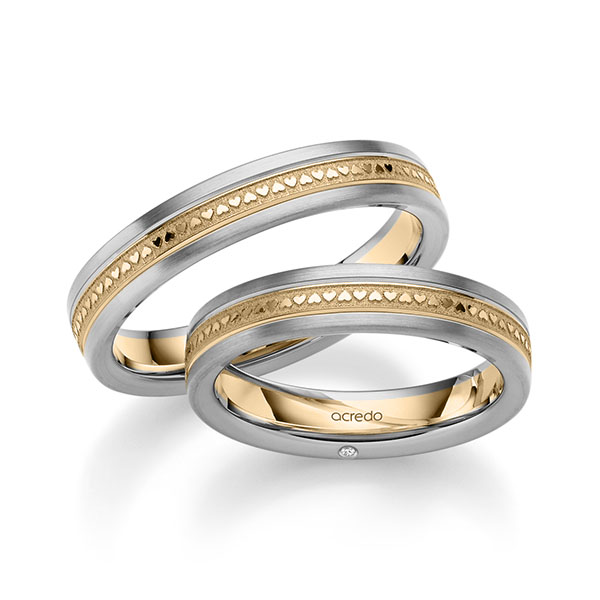Set Bicolor trouwringen in grijsgoud 14 kt. roségoud 14 kt. met in totaal 0,01 ct. Briljant tw/si van acredo