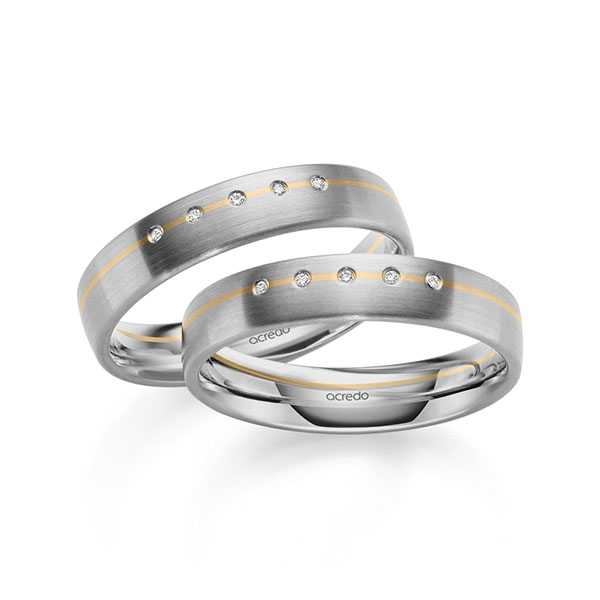 Set Bicolor trouwringen in grijsgoud 14 kt. roségoud 14 kt. met in totaal 0,05 ct. Briljant tw/si van acredo