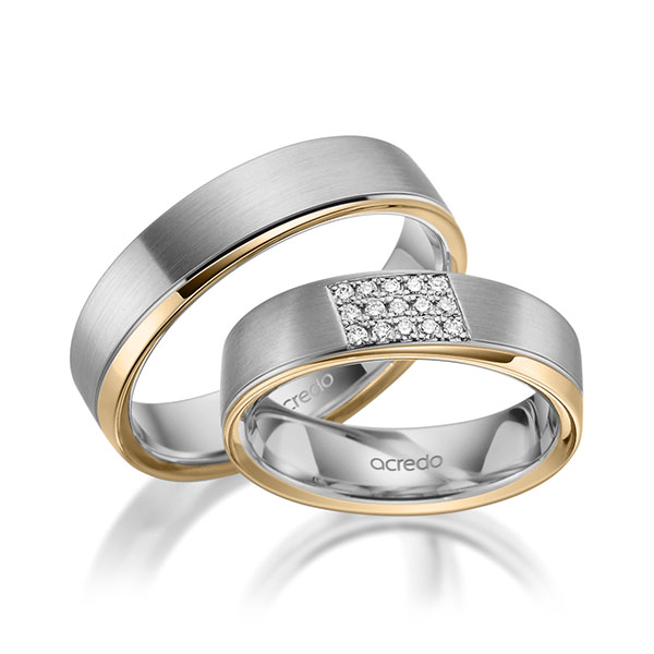 Set Bicolor trouwringen in grijsgoud 14 kt. roségoud 14 kt. met in totaal 0,12 ct. Briljant tw/si van acredo