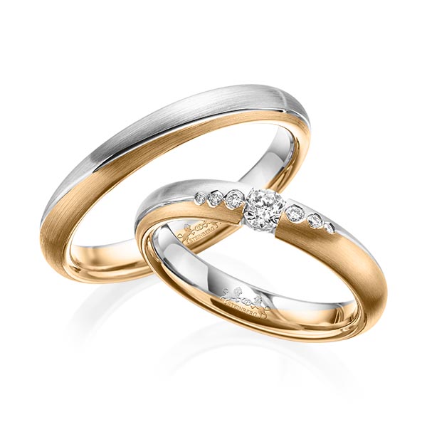 Set Bicolor trouwringen in grijsgoud 14 kt. roségoud 14 kt. met in totaal 0,18 ct. Briljant tw/si van Steinberg