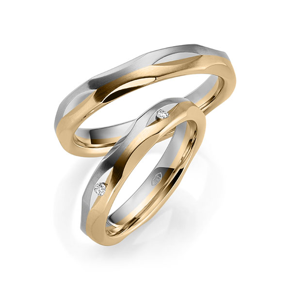 Set Bicolor trouwringen in grijsgoud 14 kt. roségoud 14 kt. met in totaal 0,1 ct. Briljant tw/si - UQ-1047-3 Set Bicolor trouwringen in grijsgoud 14 kt. roségoud 14 kt. met in totaal 0,1 ct. Briljant tw/si - UQ-1047-3