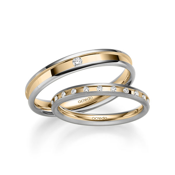 Set Bicolor trouwringen in grijsgoud 14 kt. roségoud 14 kt. met in totaal 0,26 ct. Briljant tw/si van acredo Set Bicolor trouwringen in grijsgoud 14 kt. roségoud 14 kt. met in totaal 0,26 ct. Briljant tw/si van acredo