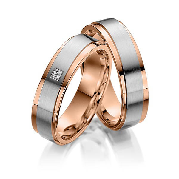 Set Bicolor trouwringen in inside roodgoud 14 kt. , outside roodgoud 14 kt. dark grey gold 14 kt. met in totaal 0,03 ct. Princess-Diamant tw,vs van acredo