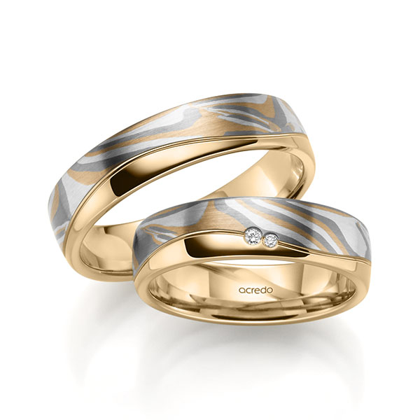 Set Bicolor trouwringen in inside roségoud 14 kt. , outside roségoud 14 kt. geelgoud 916, zilver 925, palladium 500 met in totaal 0,023 ct. Briljant tw,vs van acredo