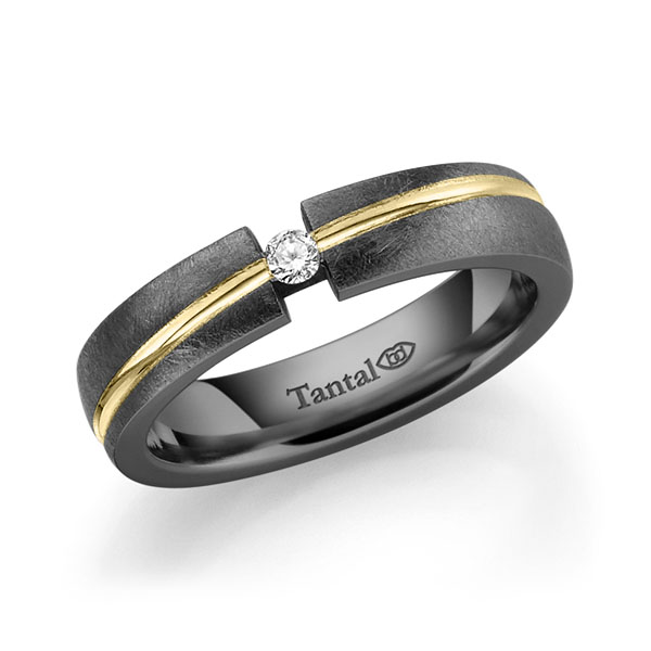 Set Bicolor trouwringen in inside Tantalum , outside Tantalum geelgoud 14 kt. met in totaal 0,06 ct. Briljant tw/si 