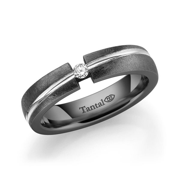 Set Bicolor trouwringen in inside Tantalum , outside Tantalum witgoud 14 kt. met in totaal 0,06 ct. Briljant tw/si 