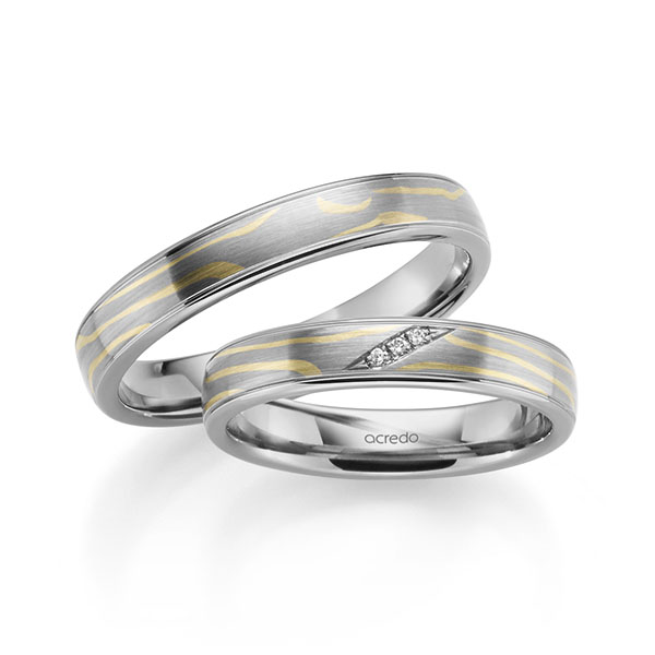 Set Bicolor trouwringen in Mokume Gane groengoud, grijsgoud 14 kt. Basis-Ring grijsgoud 14 kt. met in totaal 0,015 ct. Briljant tw,vs van acredo