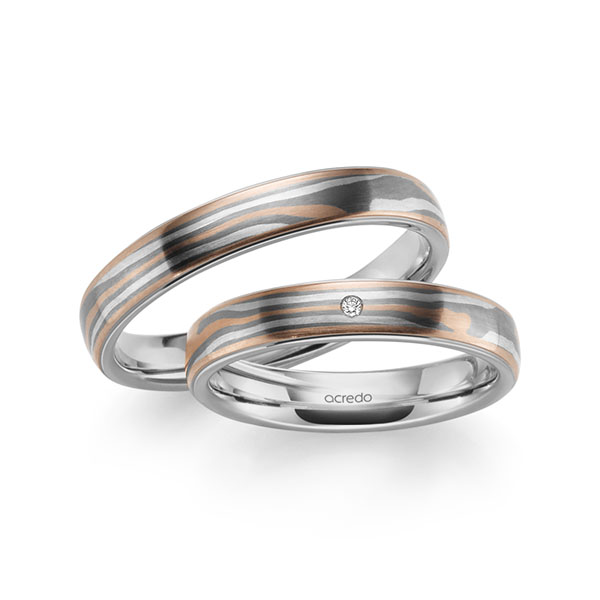 Set Bicolor trouwringen in Mokume Gane roodgoud 14 kt., zilver 925, palladium 500 Basis-Ring grijsgoud 14 kt. met in totaal 0,01 ct. Briljant tw,vs van acredo