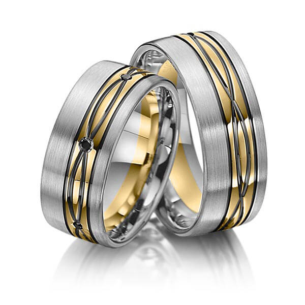 Set Bicolor trouwringen in palladium 14 kt. geelgoud 14 kt. met in totaal 0,06 ct. Briljant Zwart van Merii