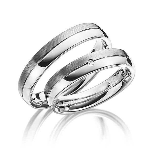 Set Bicolor trouwringen in palladium 14 kt. wit 9 kt. goudhoudend metaal (37,5%) met in totaal 0,01 ct. Briljant tw/si van Merii