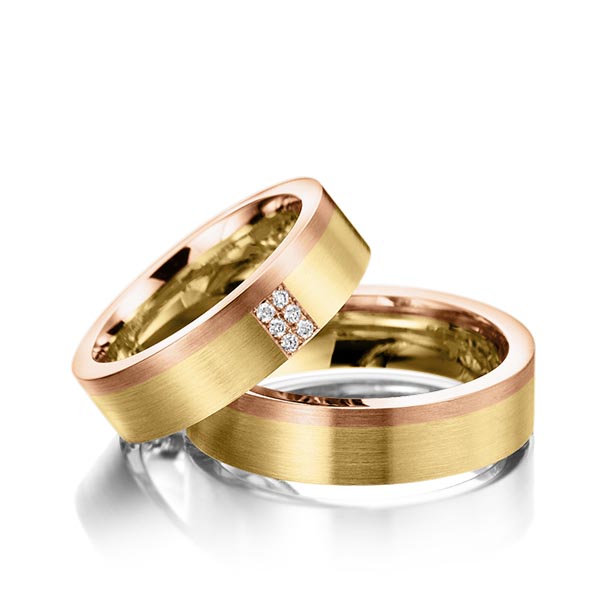 Set Bicolor trouwringen in roodgoud 14 kt. geelgoud 14 kt. met in totaal 0,06 ct. Briljant tw/si van Steinberg