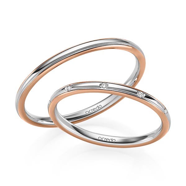 Set Bicolor trouwringen in roodgoud 14 kt. grijsgoud 14 kt. met in totaal 0,025 ct. Briljant tw/si van acredo