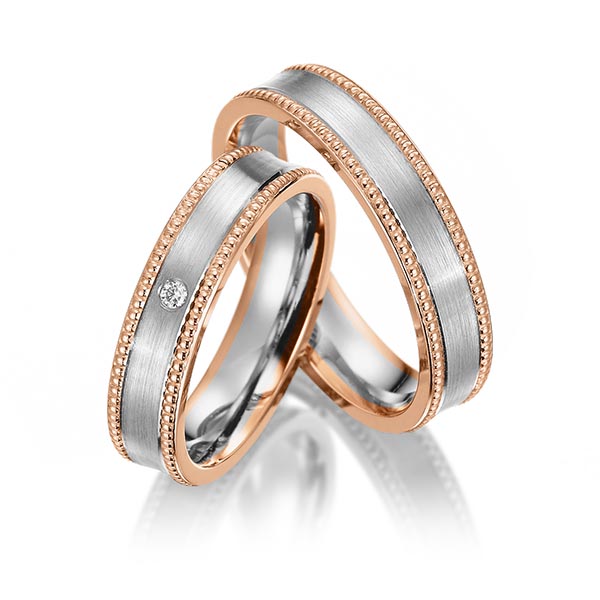 Set Bicolor trouwringen in roodgoud 14 kt. grijsgoud 14 kt. met in totaal 0,02 ct. Briljant tw/si van Merii