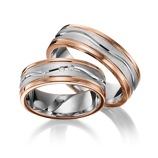 Set Bicolor trouwringen in roodgoud 14 kt. grijsgoud 14 kt. met in totaal 0,03 ct. Briljant tw/si van Merii