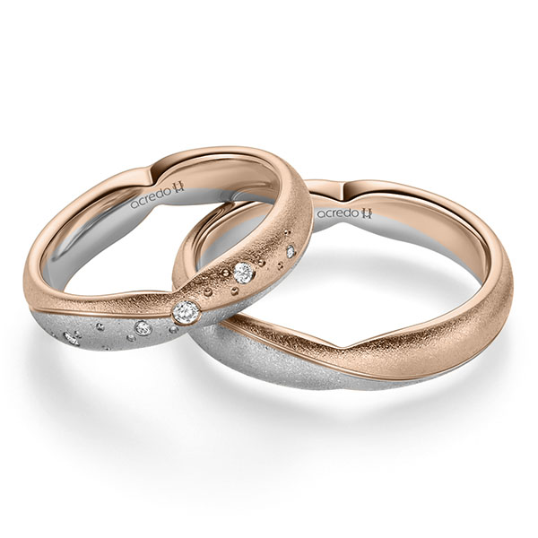 Set Bicolor trouwringen in roodgoud 14 kt. grijsgoud 14 kt. met in totaal 0,065 ct. Briljant tw/si van acredo