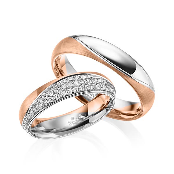 Set Bicolor trouwringen in roodgoud 14 kt. grijsgoud 14 kt. met in totaal 0,77 ct. Briljant tw/si van Steinberg