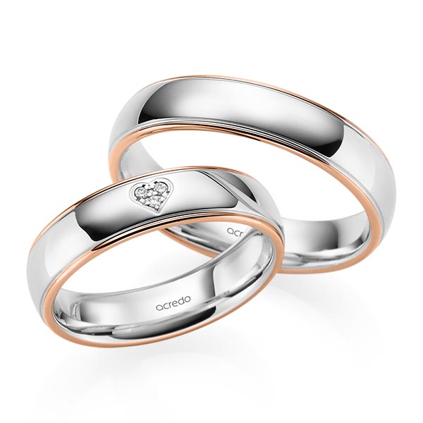Set Bicolor trouwringen in roodgoud 14 kt. witgoud 14 kt. met in totaal 0,021 ct. Briljant tw/si van acredo