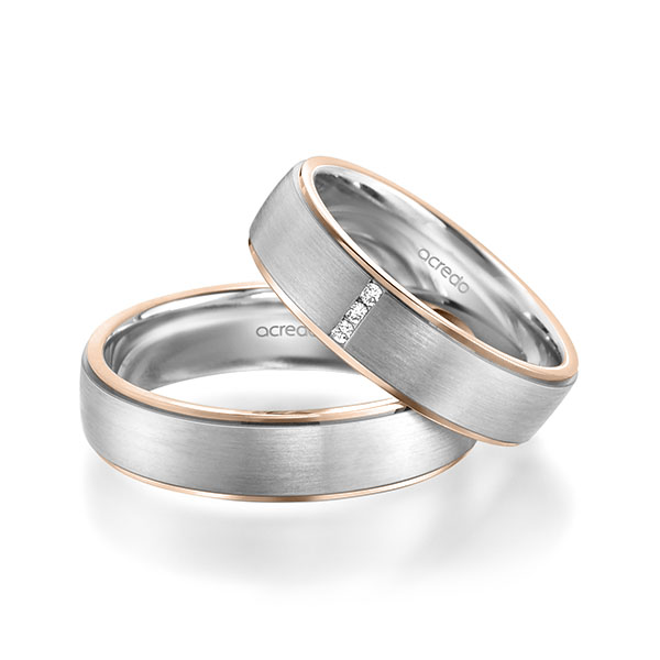 Set Bicolor trouwringen in roodgoud 14 kt. witgoud 14 kt. met in totaal 0,03 ct. Briljant tw/si van acredo