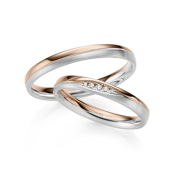 Set Bicolor trouwringen in roodgoud 14 kt. witgoud 14 kt. met in totaal 0,045 ct. Briljant tw/si van acredo