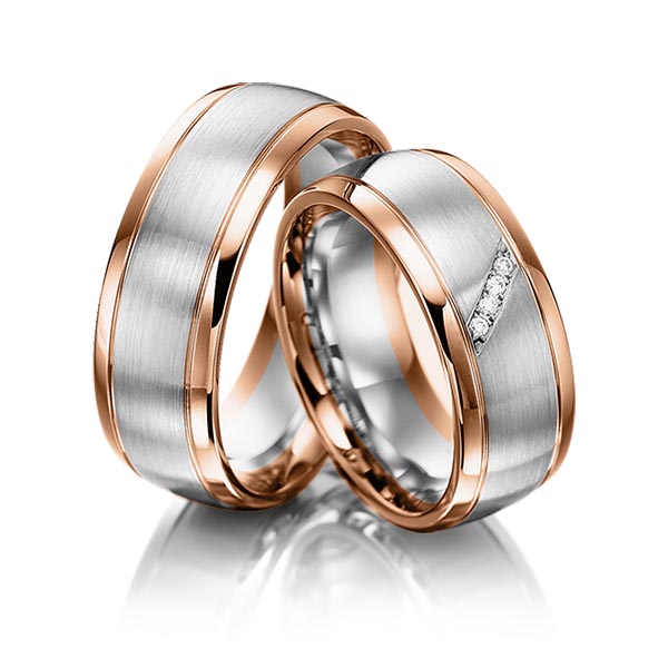 Set Bicolor trouwringen in roodgoud 14 kt. witgoud 14 kt. met in totaal 0,04 ct. Briljant tw,vs van acredo
