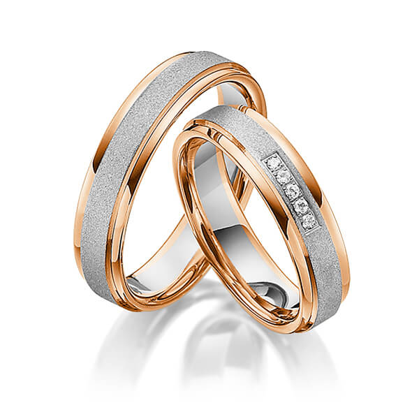 Set Bicolor trouwringen in roodgoud 14 kt. witgoud 14 kt. met in totaal 0,05 ct. Briljant tw/si van Steinberg