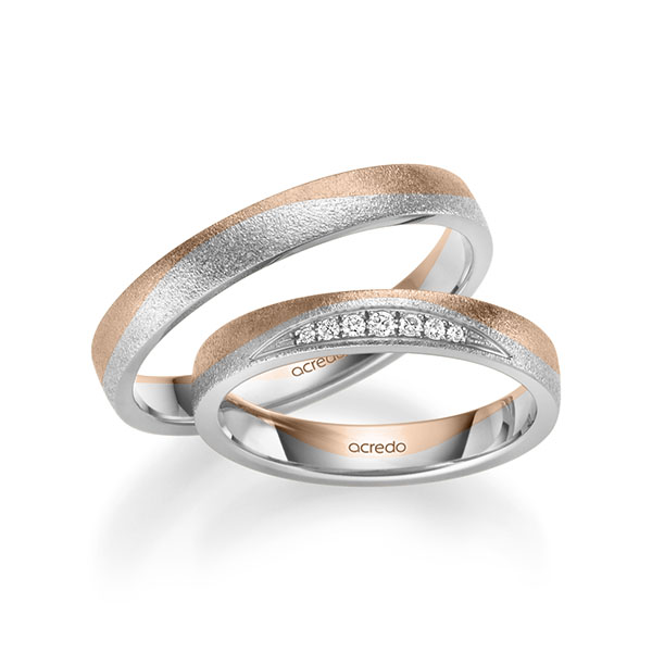 Set Bicolor trouwringen in roodgoud 14 kt. witgoud 14 kt. met in totaal 0,061 ct. Briljant tw/si van acredo