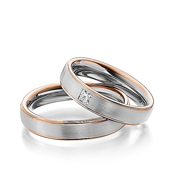 Set Bicolor trouwringen in roodgoud 14 kt. witgoud 14 kt. met in totaal 0,08 ct. Princess-Diamant tw/si van Steinberg