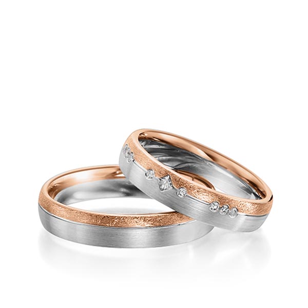 Set Bicolor trouwringen in roodgoud 14 kt. witgoud 14 kt. met in totaal 0,11 ct. Briljant & Princess-Diamant tw/si van Steinberg