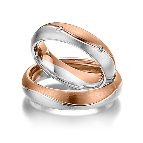 Set Bicolor trouwringen in roodgoud 14 kt. witgoud 14 kt. met in totaal 0,12 ct. Briljant tw/si van Steinberg