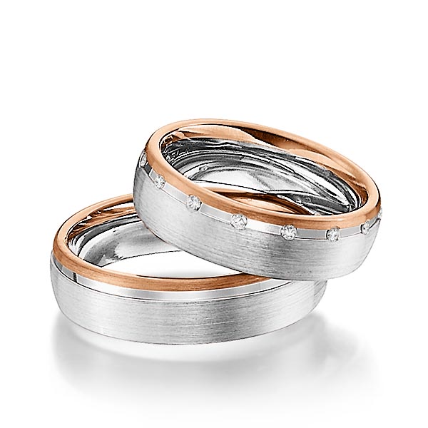 Set Bicolor trouwringen in roodgoud 14 kt. witgoud 14 kt. met in totaal 0,15 ct. Briljant tw/si van Steinberg