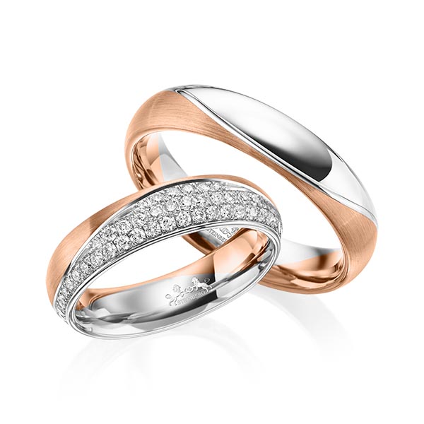 Set Bicolor trouwringen in roodgoud 14 kt. witgoud 14 kt. met in totaal 0,77 ct. Briljant tw/si van Steinberg