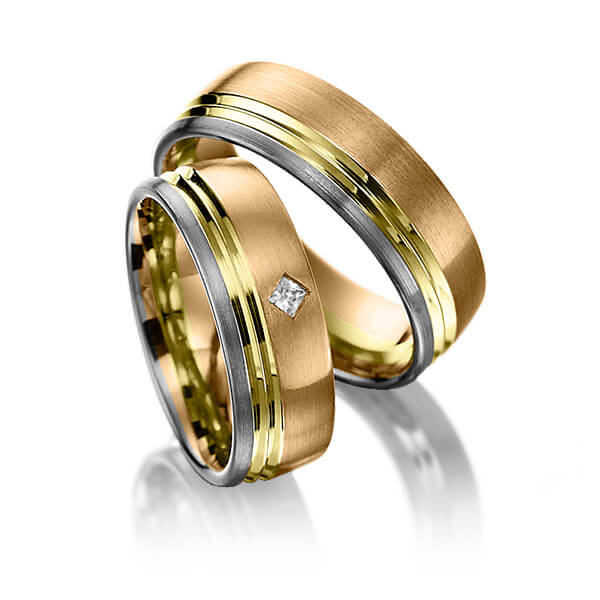 Set Bicolor trouwringen in roségoud 14 kt. geelgoud 14 kt. palladium 14 kt. met in totaal 0,05 ct. Princess-Diamant tw/si van Merii
