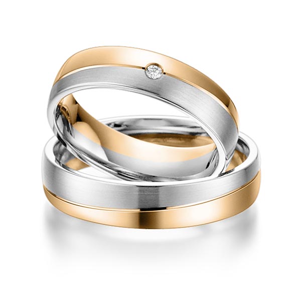 Set Bicolor trouwringen in roségoud 14 kt. grijsgoud 14 kt. met in totaal 0,015 ct. Briljant tw/si van acredo