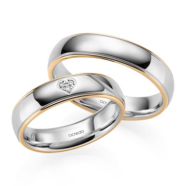 Set Bicolor trouwringen in roségoud 14 kt. grijsgoud 14 kt. met in totaal 0,021 ct. Briljant tw/si van acredo
