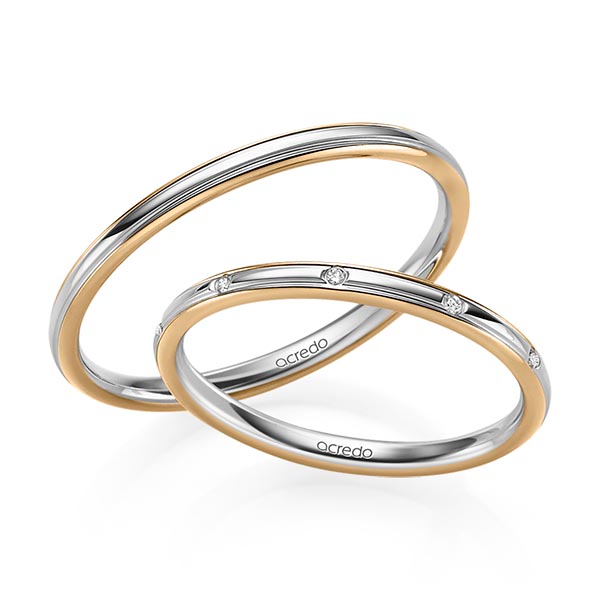 Set Bicolor trouwringen in roségoud 14 kt. grijsgoud 14 kt. met in totaal 0,025 ct. Briljant tw/si van acredo