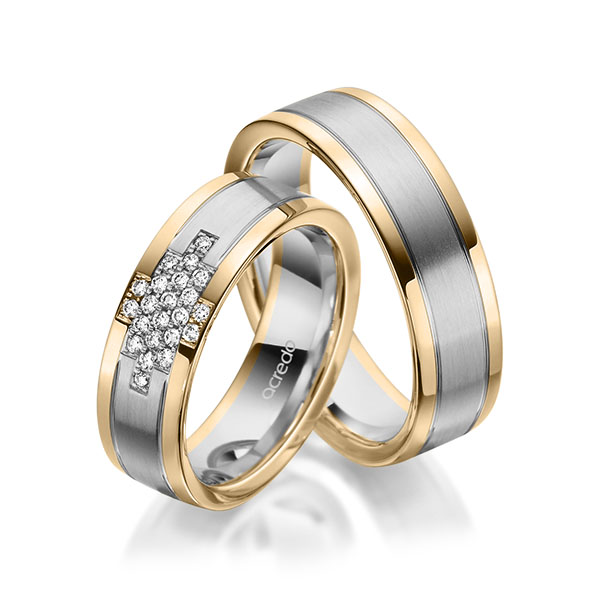 Set Bicolor trouwringen in roségoud 14 kt. grijsgoud 14 kt. met in totaal 0,186 ct. Briljant tw/si van acredo