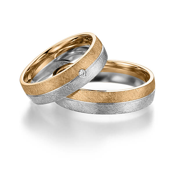 Set Bicolor trouwringen in roségoud 14 kt. witgoud 14 kt. met in totaal 0,015 ct. Briljant tw,vs van acredo