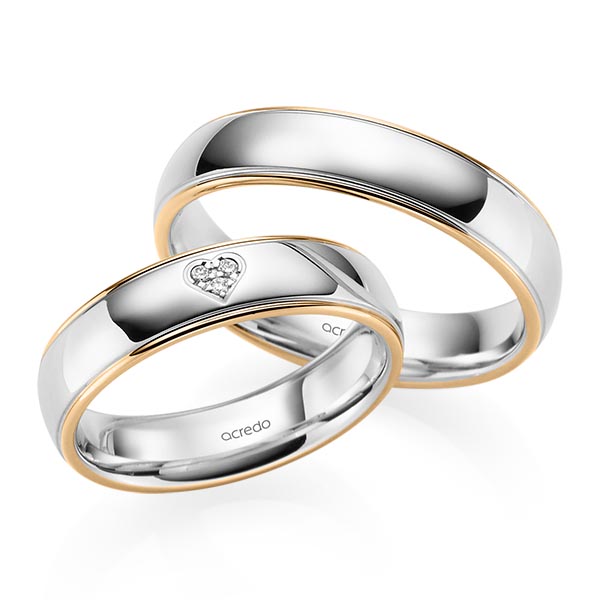 Set Bicolor trouwringen in roségoud 14 kt. witgoud 14 kt. met in totaal 0,021 ct. Briljant tw/si van acredo