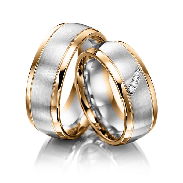 Set Bicolor trouwringen in roségoud 14 kt. witgoud 14 kt. met in totaal 0,04 ct. Briljant tw,vs van acredo